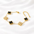 Noir Pavé Clover Bracelet – gold bracelet with black pavé clover charms
