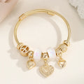 Gold Heart Charm Bangle