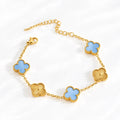 Sky Sunburst Clover Bracelet – gold bracelet with sky blue sunburst clover charm