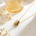 Eternal Bond Interlocking Necklace – interlocking two-ring necklace styled shot